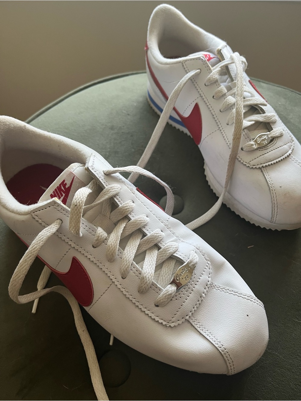 Nike Women's 8.5 White Leather Sneakers with Red Swoosh